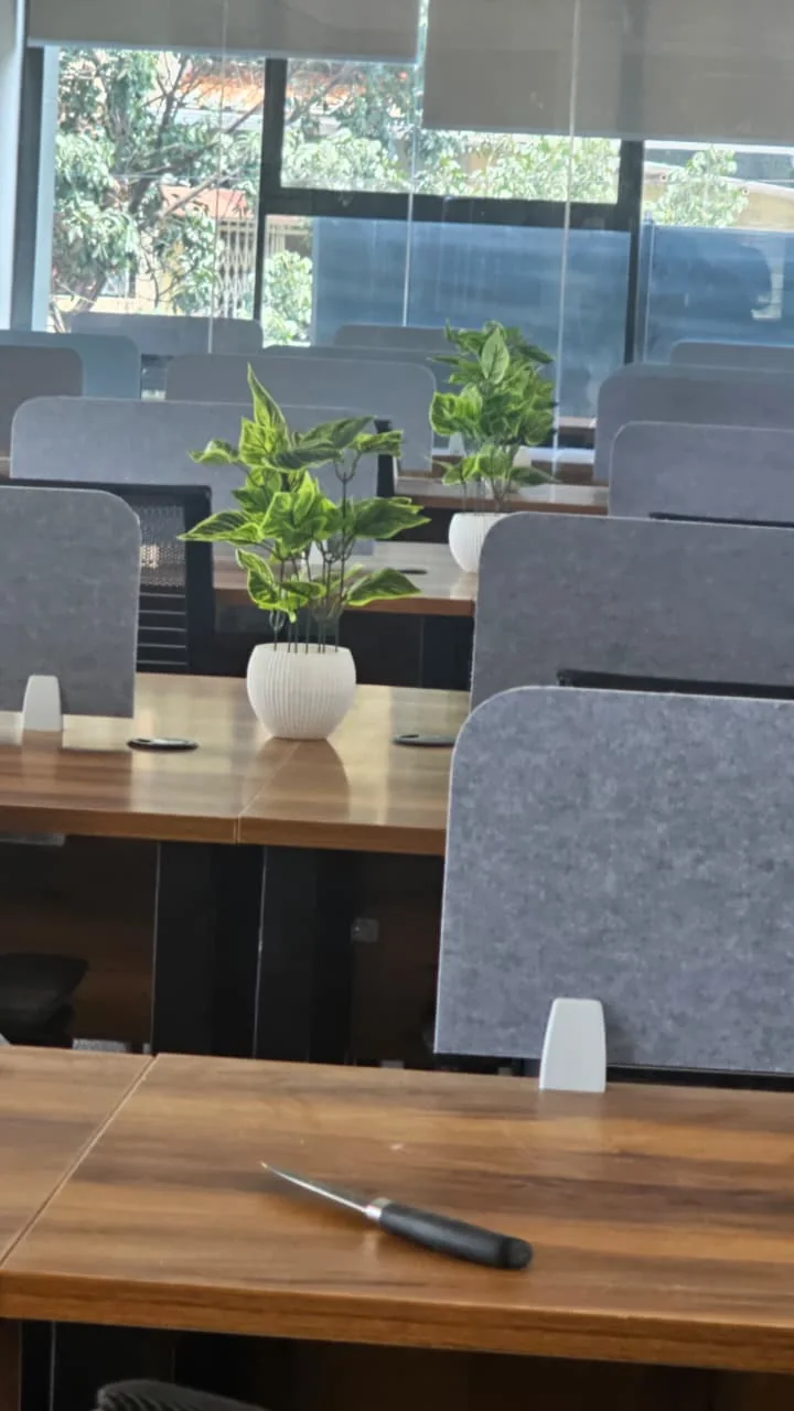 Desk and interior view at The Meridian Cowork & Business Suites